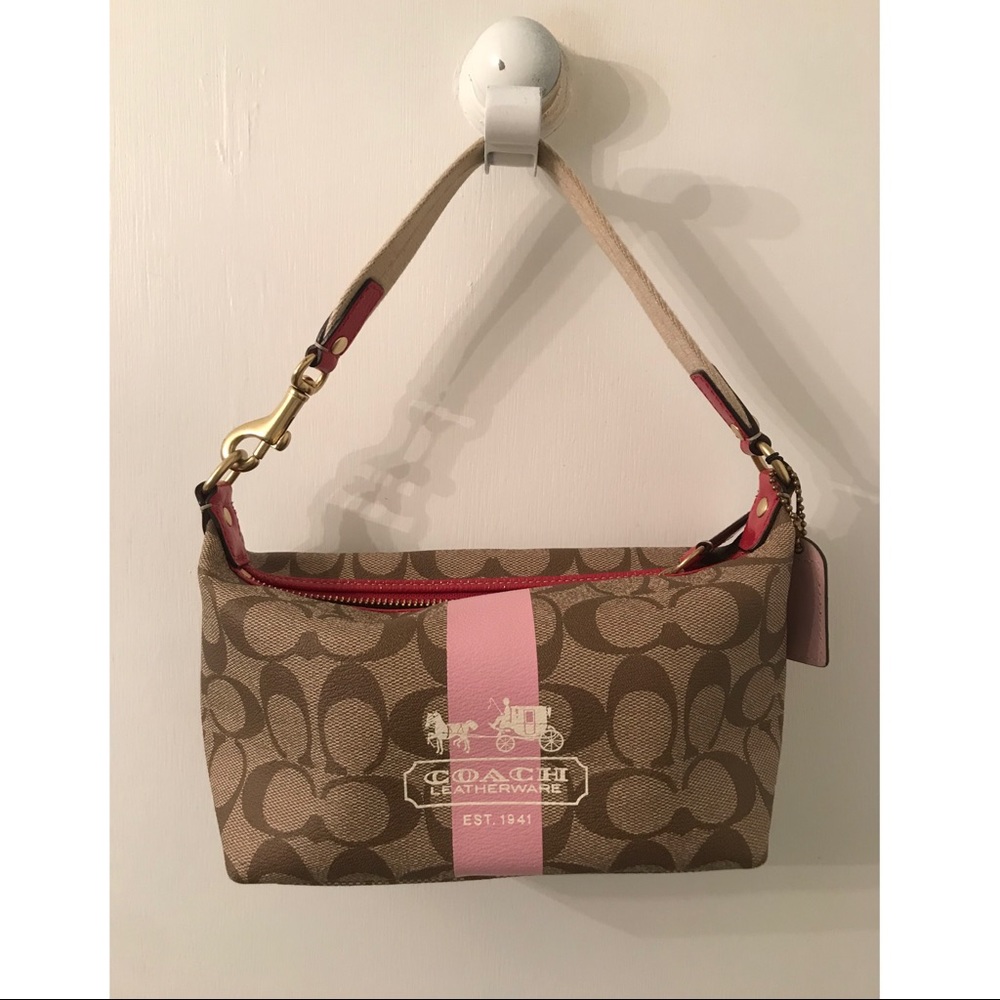 Small Coach Purse With Pink Detail.